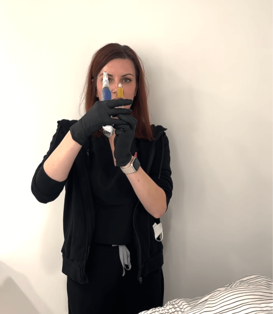 Clinician holding a syringe filled with platelet-rich plasma before PRP facial application. Cleveland, Ohio